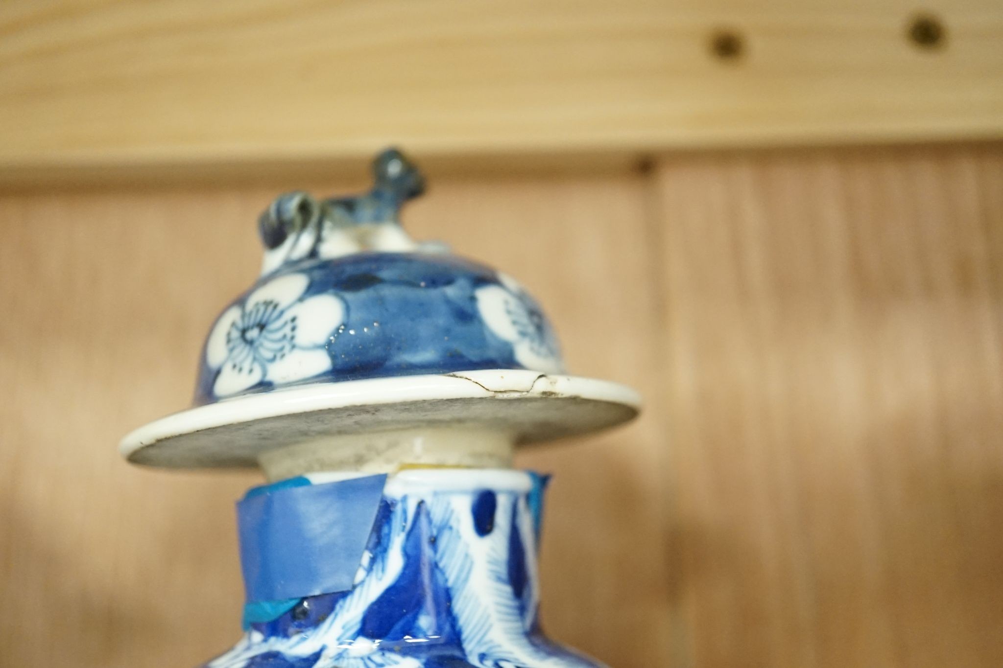 A pair of Chinese blue and white vases and eleven jars, six with covers., Vase and matching cover 28 cms high.